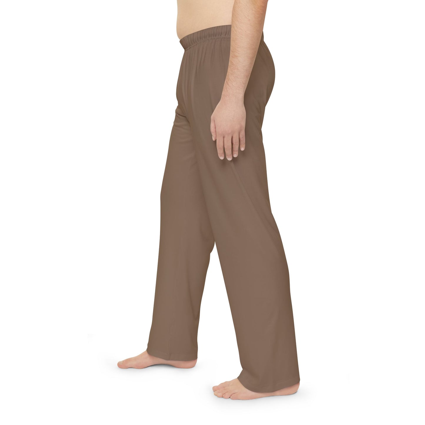 Brown pants worn by a person on a white background