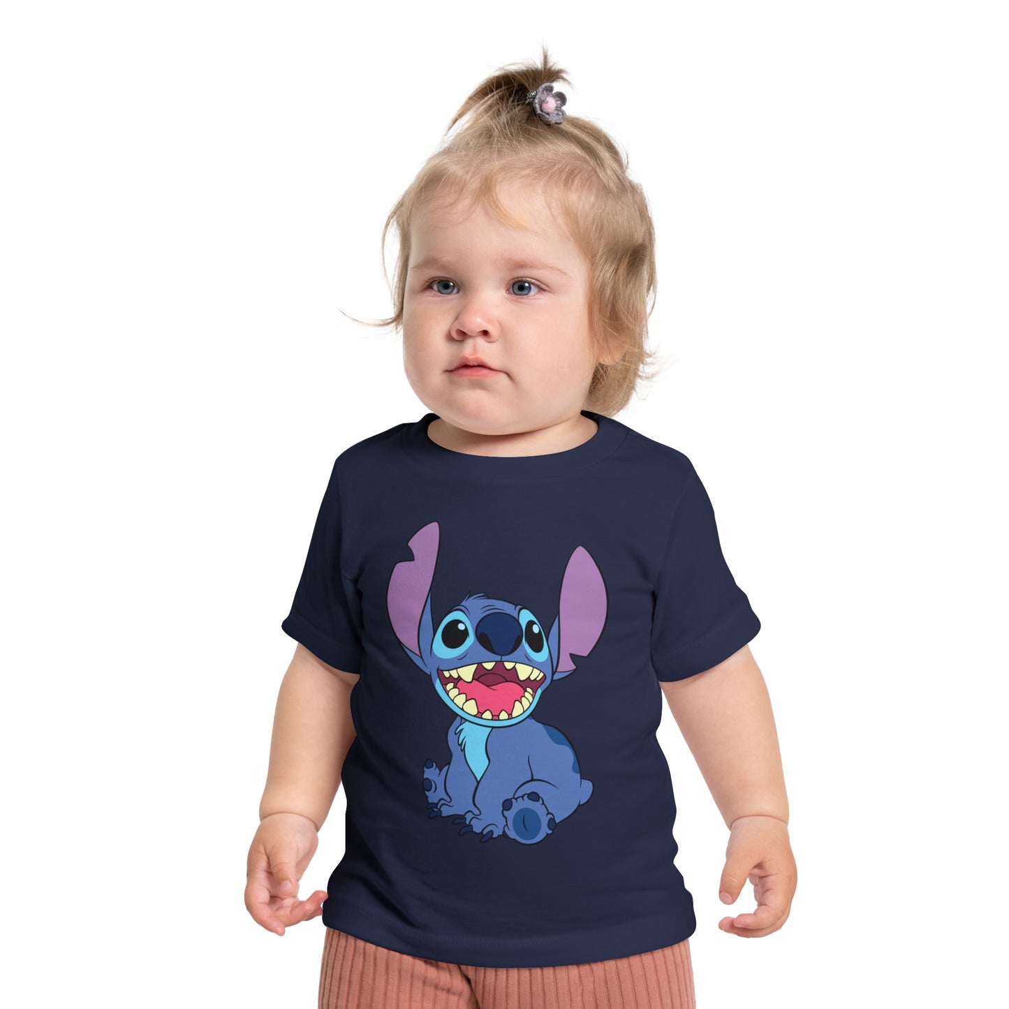 Child wearing a navy blue t-shirt with a cartoon character on a white background.
