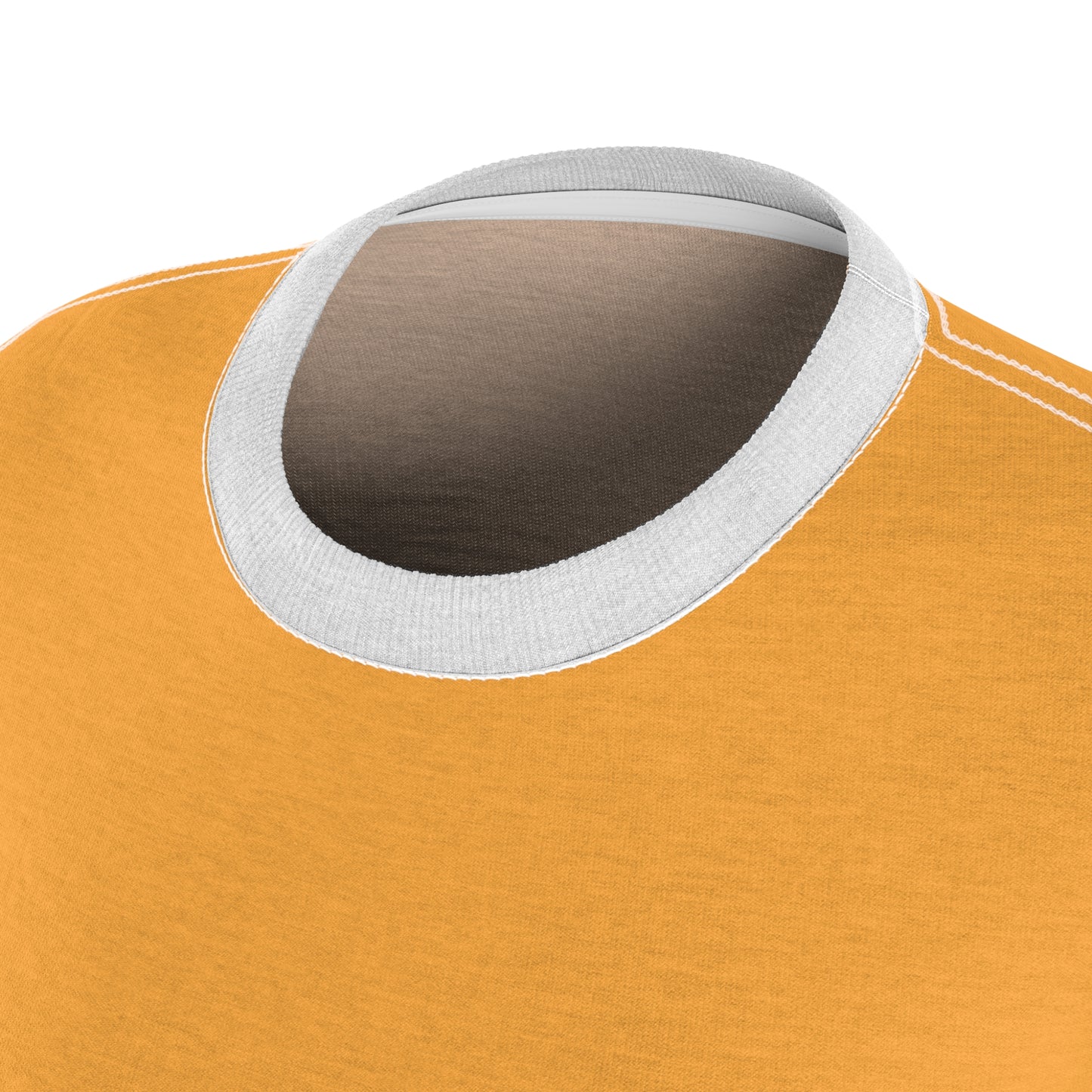 Close-up of a mustard yellow garment with a brown patch and white trim on a white background