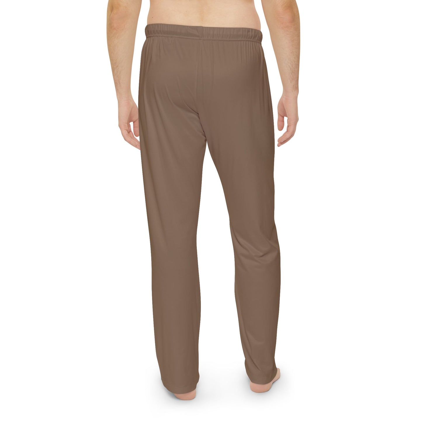 Brown pants worn by a person on a white background