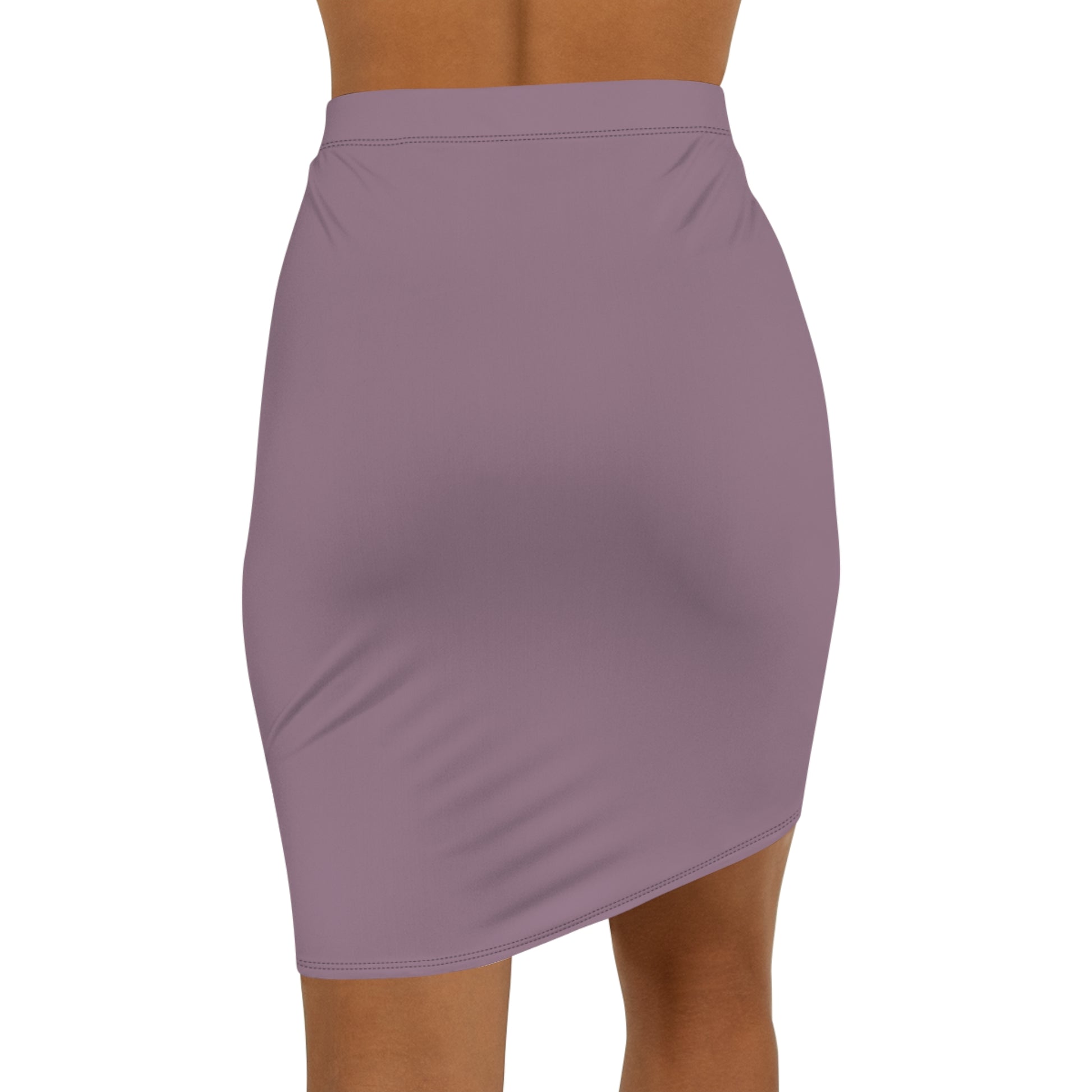 Purple skirt worn by a person on a white background